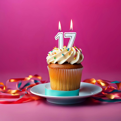 Cupcake with the letters one and seven along with candles atop them celebrating the birthday of Enovana Green Cleaning