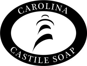 Black Carolina Castile Soap logo featuring a stylized olive leaf within a circular emblem.