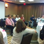 Entrepreneur panel featuring Joe McCutcheon of Triangle Green Cleaning speaking to cleaning business owners.