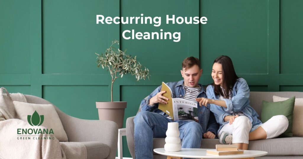A couple relaxing on a sofa in a clean living room in Raleigh, NC — representing the comfort and peace of mind that comes with Enovana Green Cleaning's recurring house cleaning service