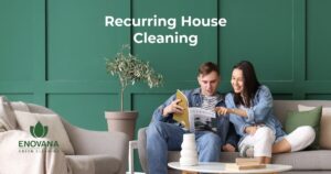 A couple relaxing on a sofa in a clean living room in Raleigh, NC — representing the comfort and peace of mind that comes with Enovana Green Cleaning's recurring house cleaning service