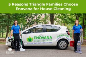 Two Enovana Green Cleaning team members in branded blue polos standing beside a branded service vehicle with cleaning supplies and a vacuum, representing trusted house cleaning for Raleigh, Durham, and Cary families.